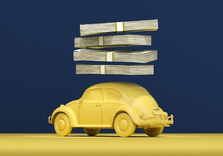 Yellow vintage car figurine with several stacks of cash floating above it on a yellow floor against a dark blue background.