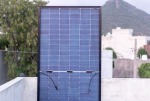 Close-up of a blue rooftop solar panel in bright daylight, illustrating how a single module captures energy for RV power systems